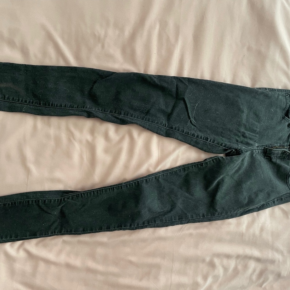 High-waisted distressed black jeans